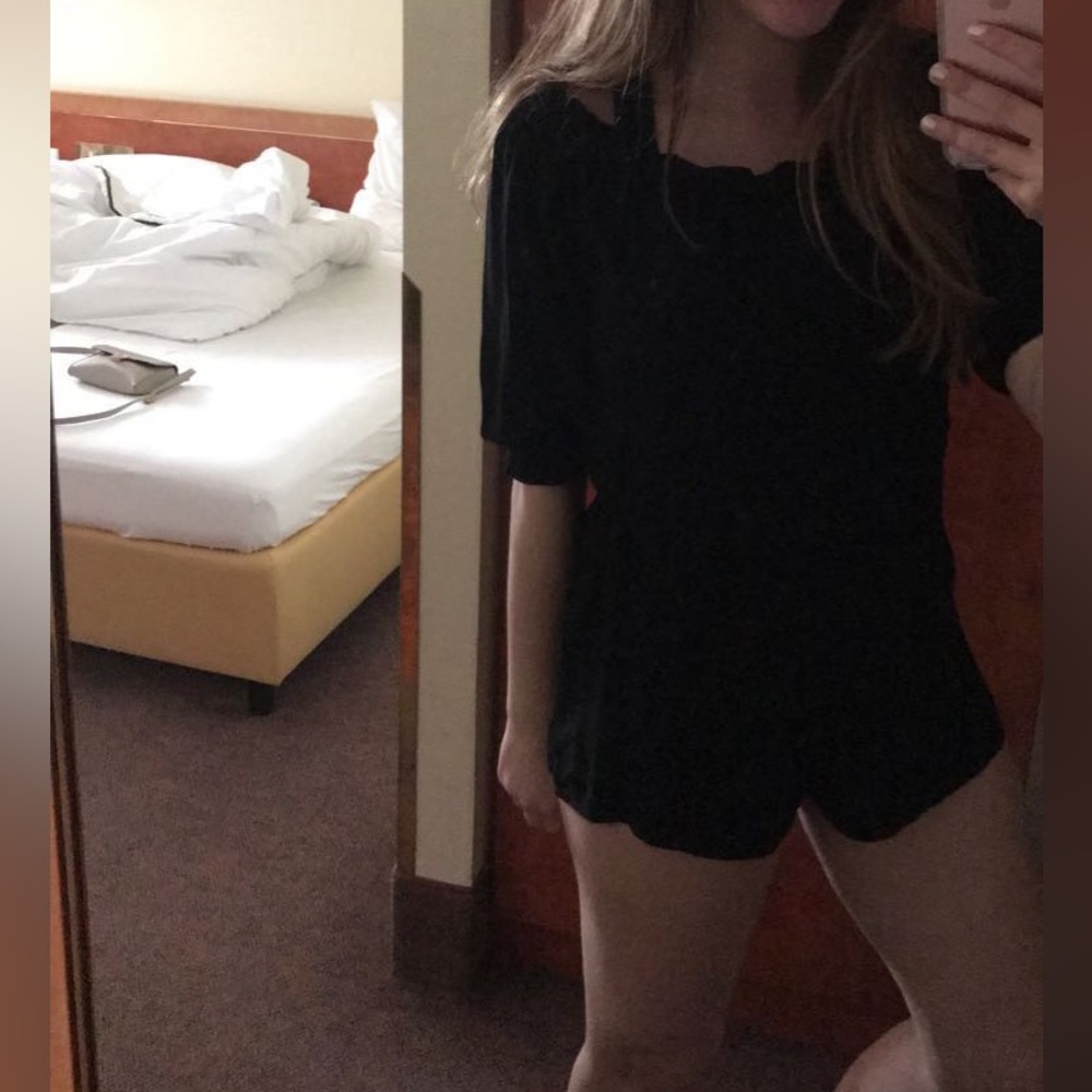 Subdued black romper from Italy